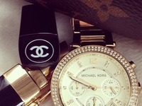 Złoty zegarek od MK